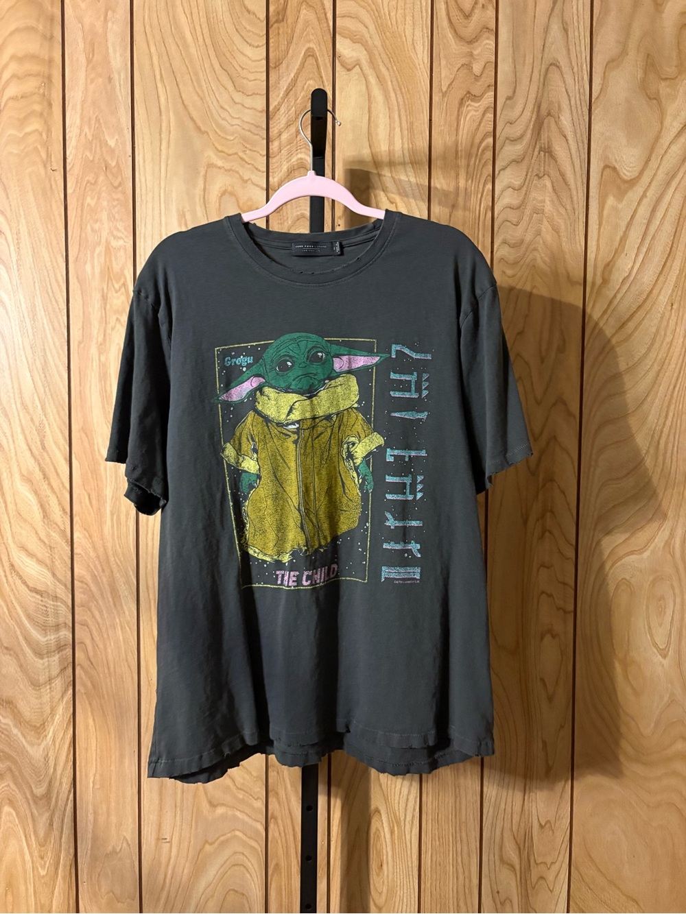 Junk Food Clothing Black Tee with Green and Yellow Graphic